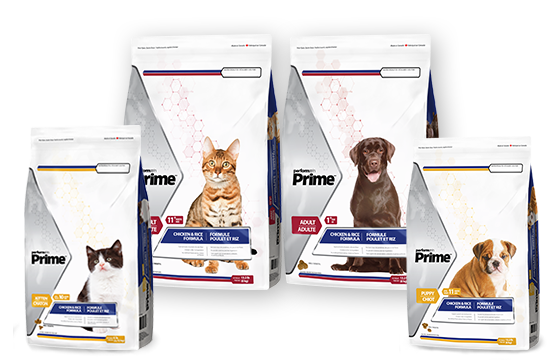 Several bags of Performatrin Prime pet food, each featuring a different pet: a cat, a dog, a kitten, and an adult dog.